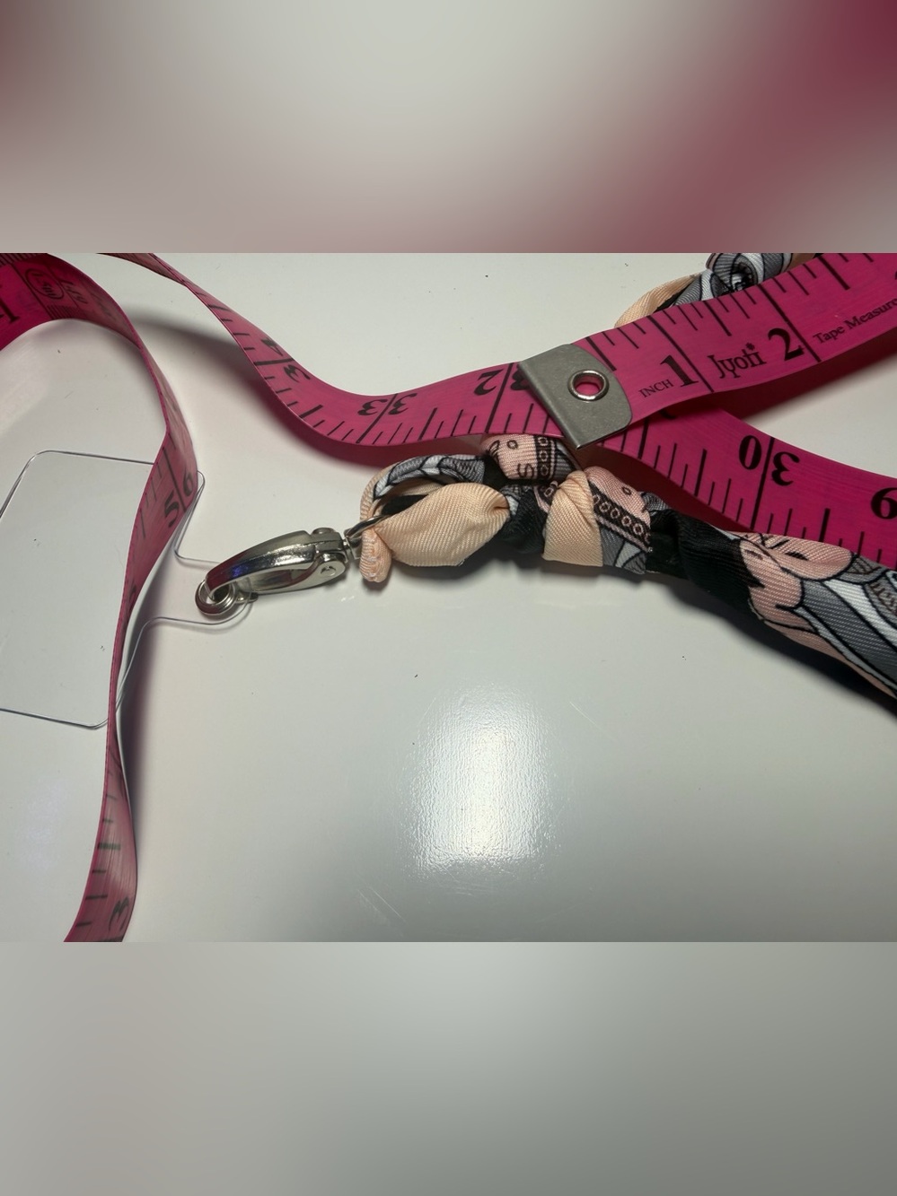 Silk-Twilly Pink and Black tied onto a leather lanyard holder/cell phone cord. - Picture 8 of 12